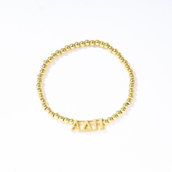 B211 - Sorority: Gold Beaded Bracelet with Greek Letters on Stretch Cord