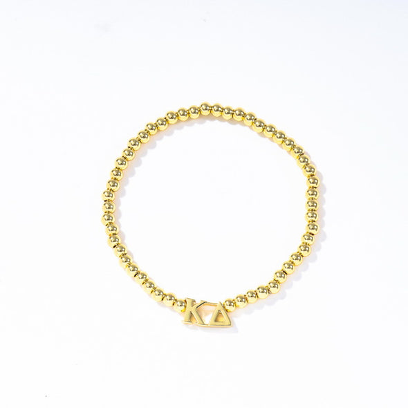 B211 - Sorority: Gold Beaded Bracelet with Greek Letters on Stretch Cord