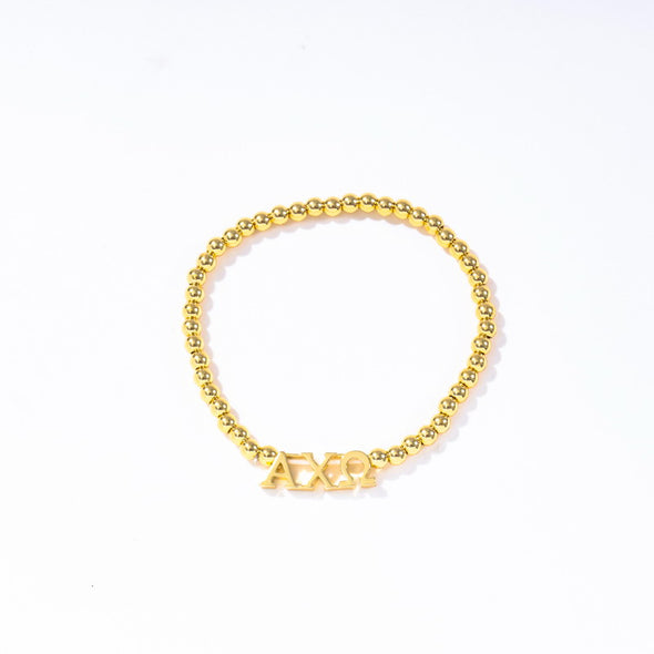 B211 - Sorority: Gold Beaded Bracelet with Greek Letters on Stretch Cord