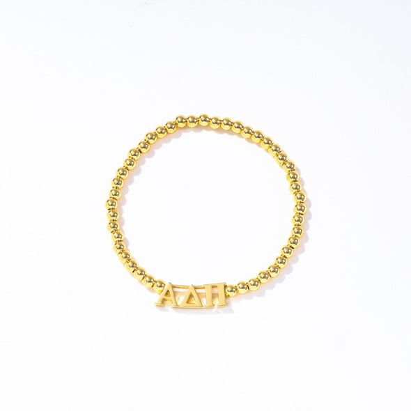 B211 - Sorority: Gold Beaded Bracelet with Greek Letters on Stretch Cord